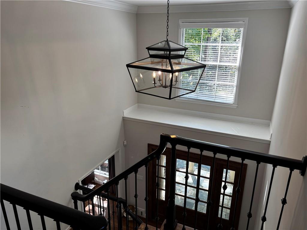 45 Blackland Road Northwest Atlanta, GA 30342 - Photo 20 of 31 a view of a hallway with wooden floor and staircase