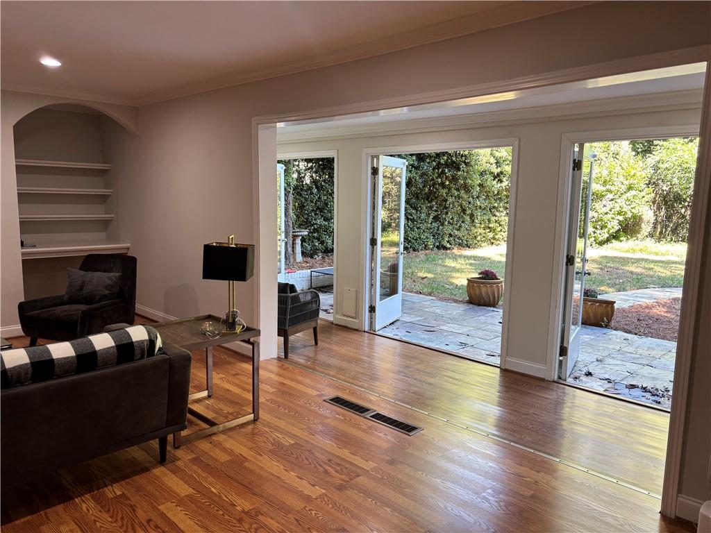 45 Blackland Road Northwest Atlanta, GA 30342 - Photo 6 of 31 a living room with furniture and a large window