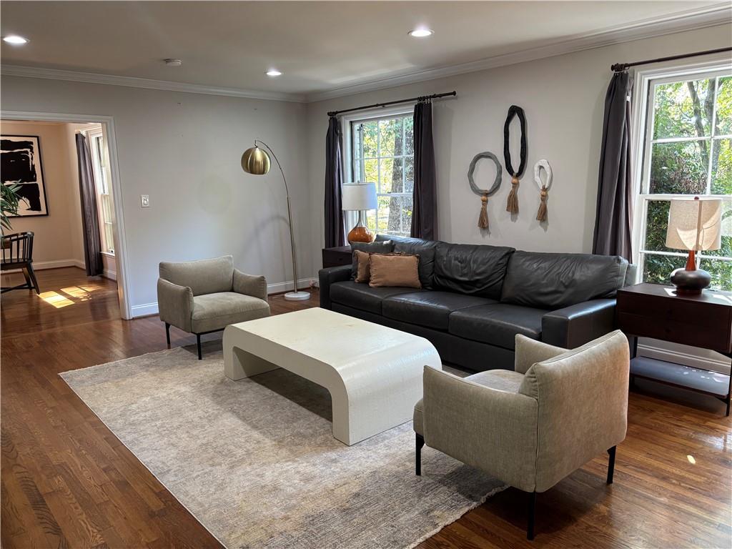 45 Blackland Road Northwest Atlanta, GA 30342 - Photo 10 of 31 a living room with furniture and a large window