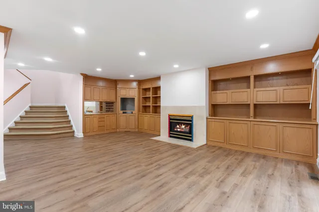 a bathroom with a toilet and mirror