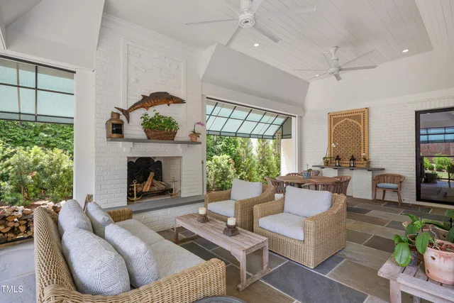 a spacious bedroom with a bed and a window