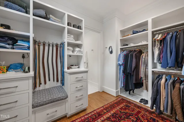 a view of entryway with wooden floor and a rug