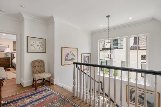 a bathroom with a toilet sink vanity and mirror