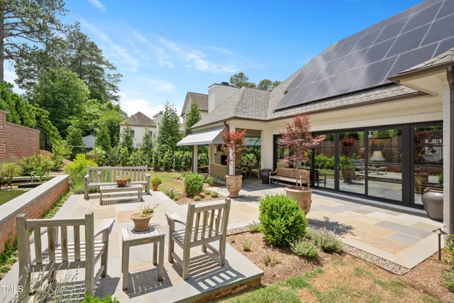 a brick building with a yard