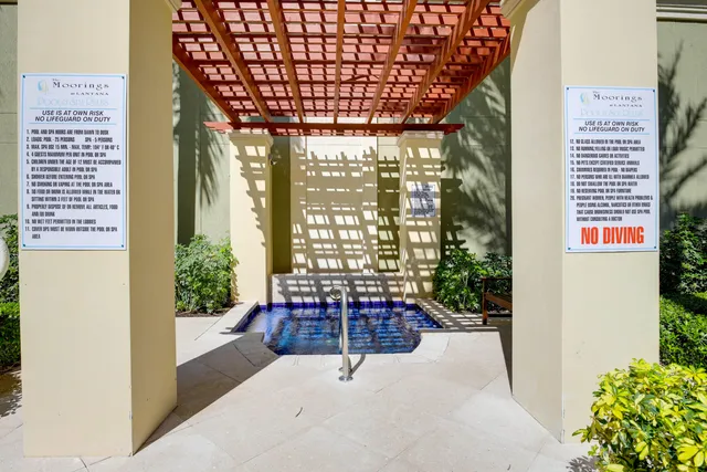 a lobby with furniture and window