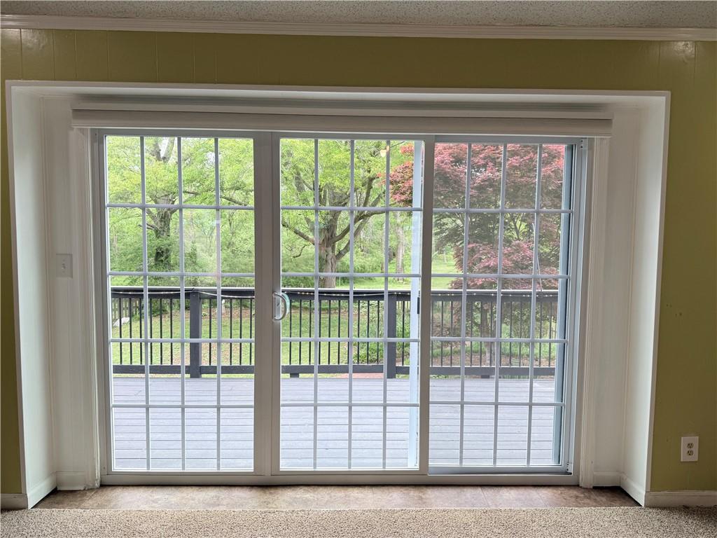 3033 Riviera Drive Conyers, GA 30012 - Photo 8 of 79 a view of a room that has a sliding door