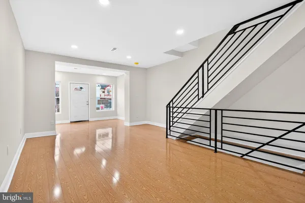 a view of a hallway with staircase