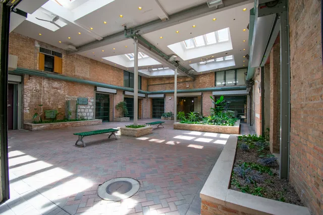 a view of a building with a street