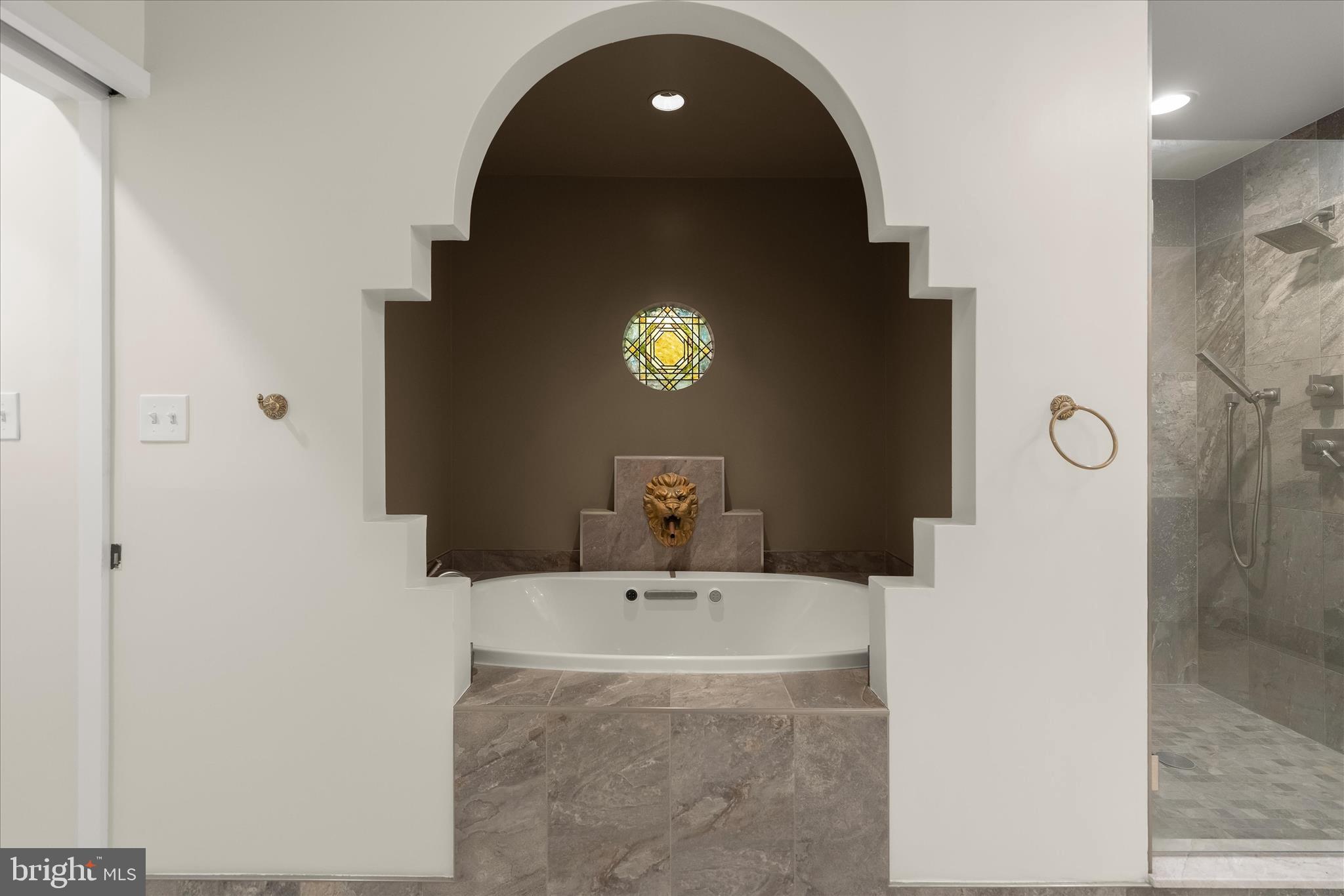 5104 Scarsdale Road Bethesda, MD 20816 - Photo 37 of 68 a bathroom with a sink a toilet and a mirror