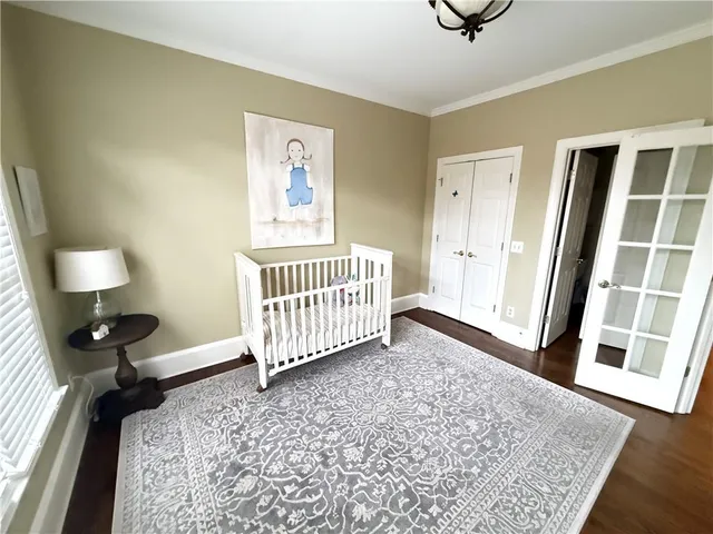 a view of a livingroom with furniture and wooden floor