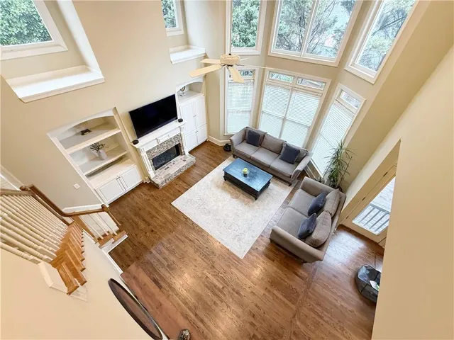 a view of workspace with wooden floor and window