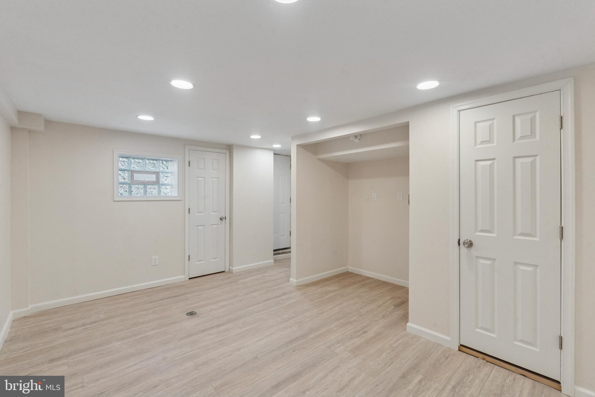 8327 Forrest Avenue Philadelphia, PA 19150 - Photo 14 of 14 a view of an empty room with wooden floor