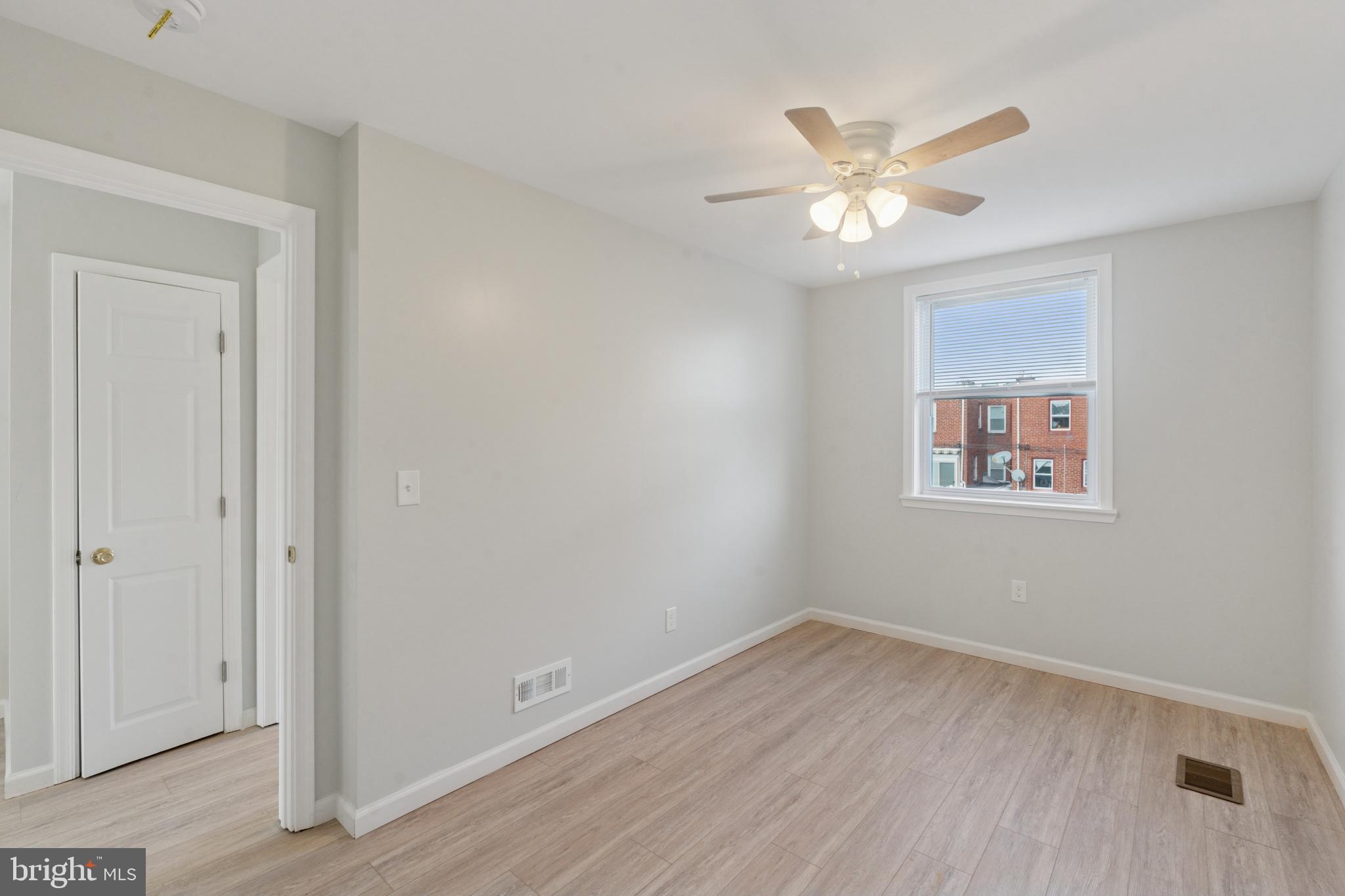8327 Forrest Avenue Philadelphia, PA 19150 - Photo 4 of 14 a view of wooden floor and chandelier fan in a room