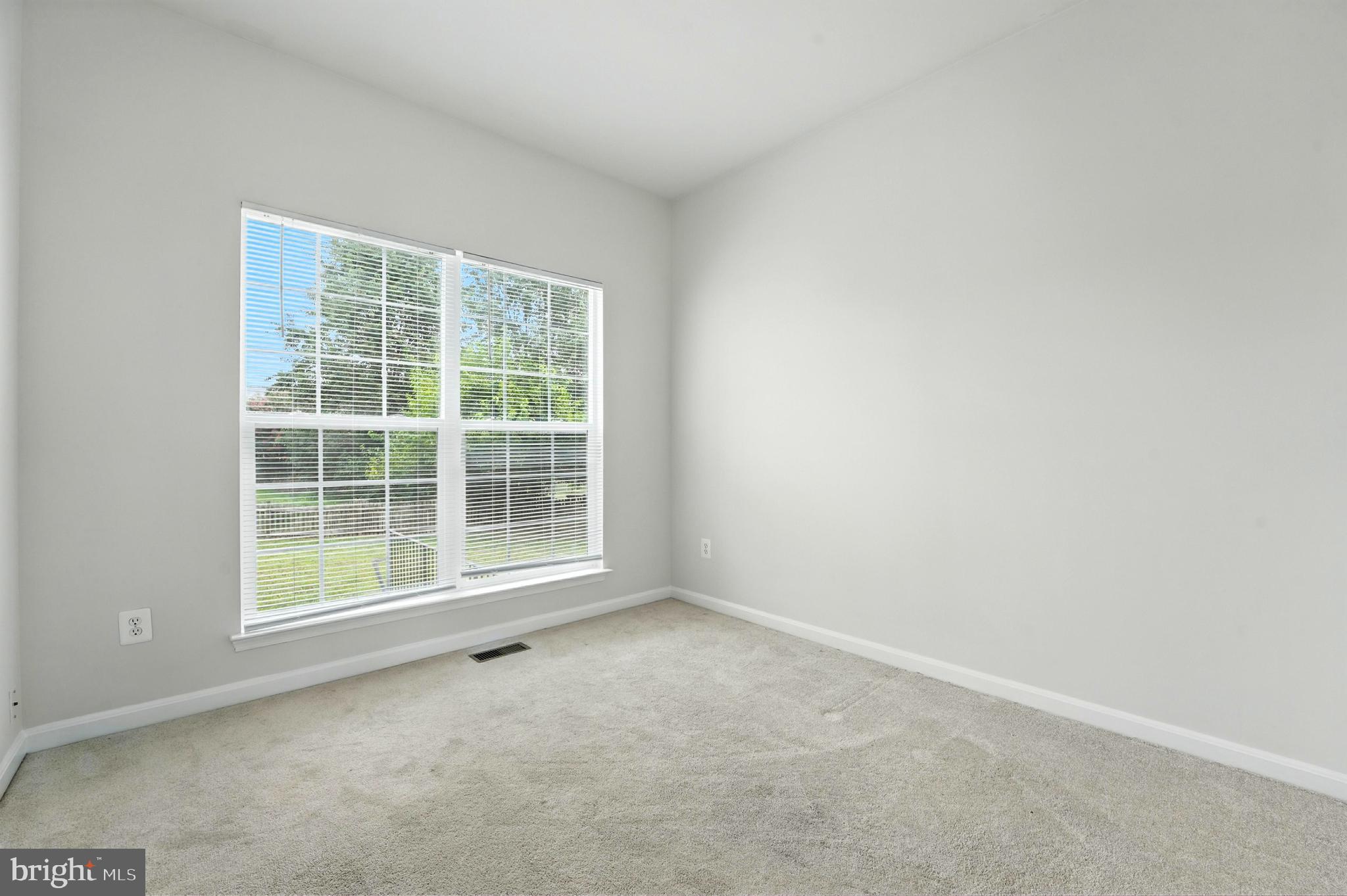 705 Holly Leaf Road Culpeper, VA 22701 - Photo 16 of 62 an empty room with a window