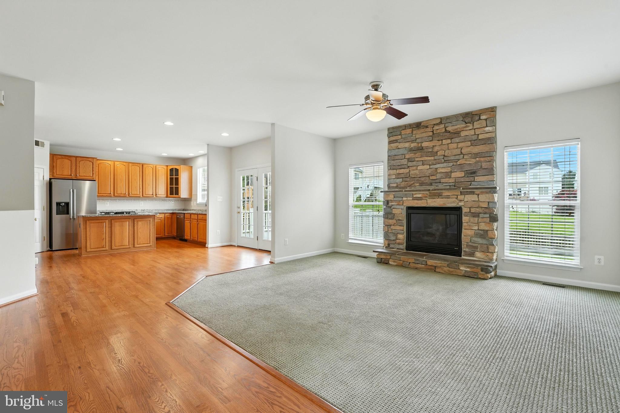 705 Holly Leaf Road Culpeper, VA 22701 - Photo 18 of 62 a view of empty room with wooden floor and fireplace