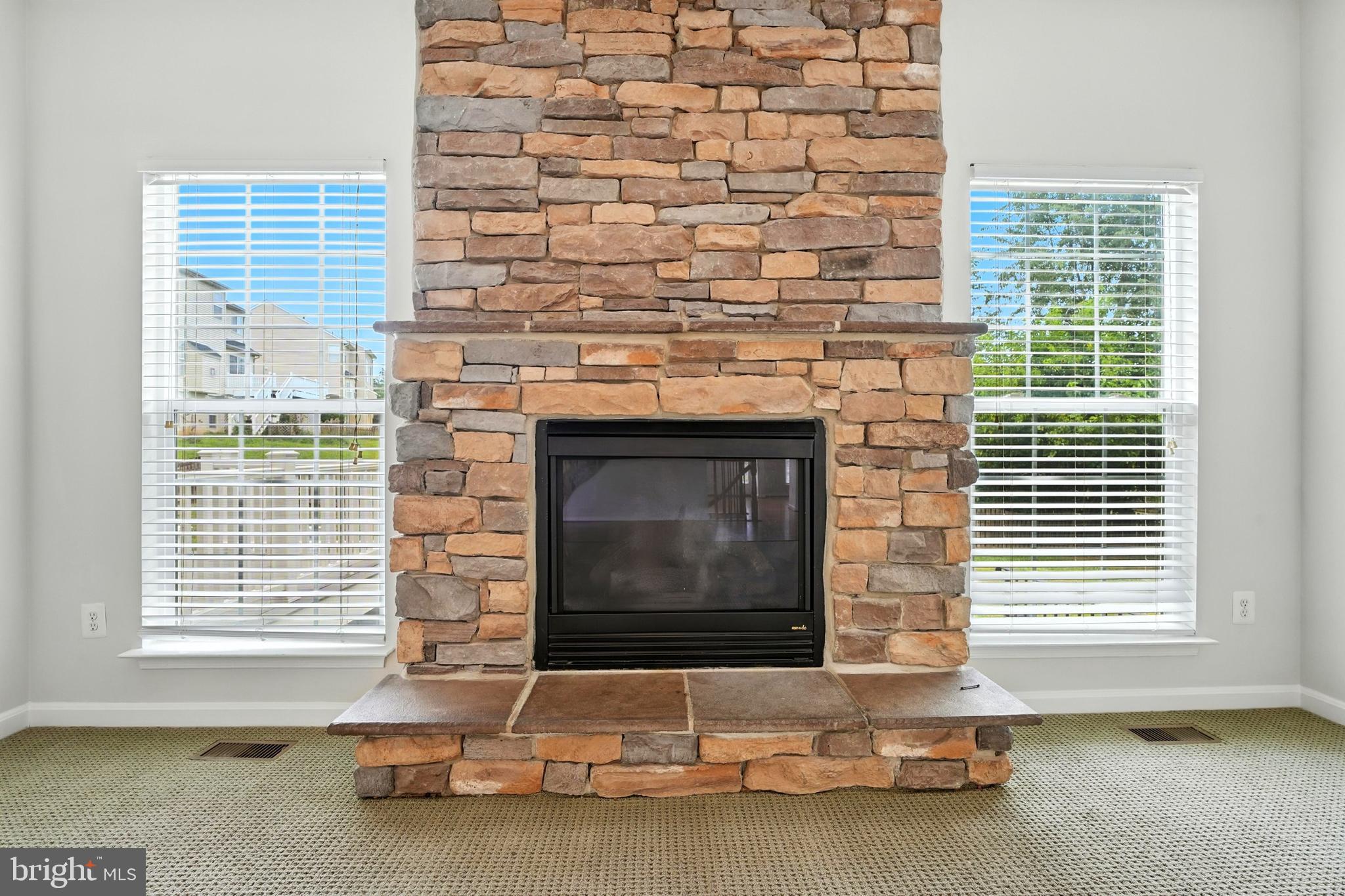 705 Holly Leaf Road Culpeper, VA 22701 - Photo 20 of 62 a living room with a fireplace
