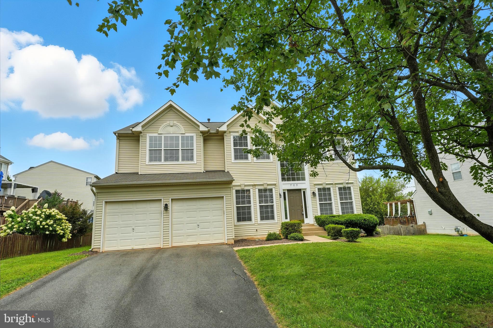 705 Holly Leaf Road Culpeper, VA 22701 - Photo 2 of 62 front view of a house with a garden