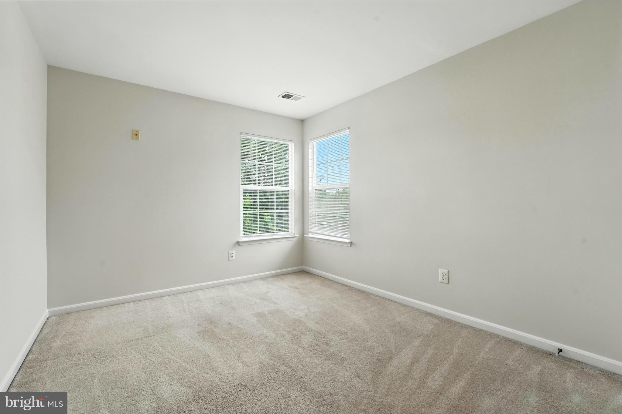705 Holly Leaf Road Culpeper, VA 22701 - Photo 33 of 62 an empty room with windows