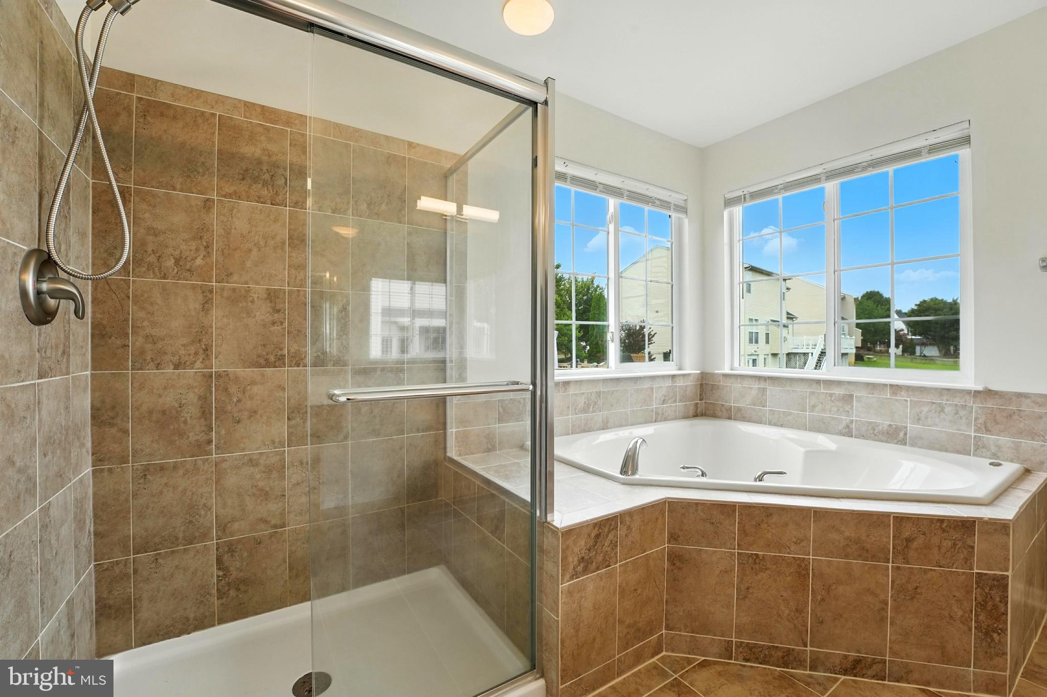 705 Holly Leaf Road Culpeper, VA 22701 - Photo 42 of 62 a bath tub sitting next to a shower