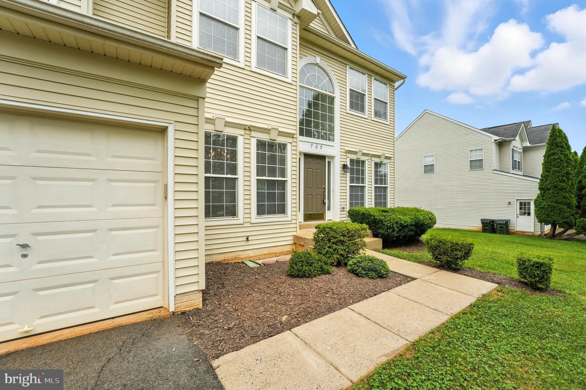 705 Holly Leaf Road Culpeper, VA 22701 - Photo 60 of 62 a view of a house with a yard
