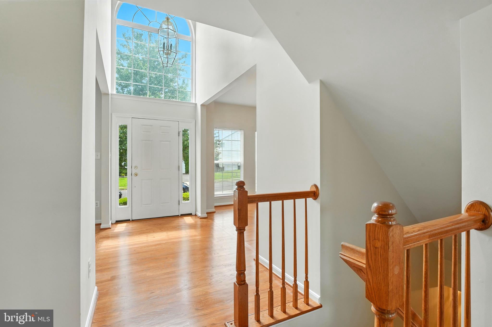 705 Holly Leaf Road Culpeper, VA 22701 - Photo 7 of 62 a view of an entryway with wooden floor