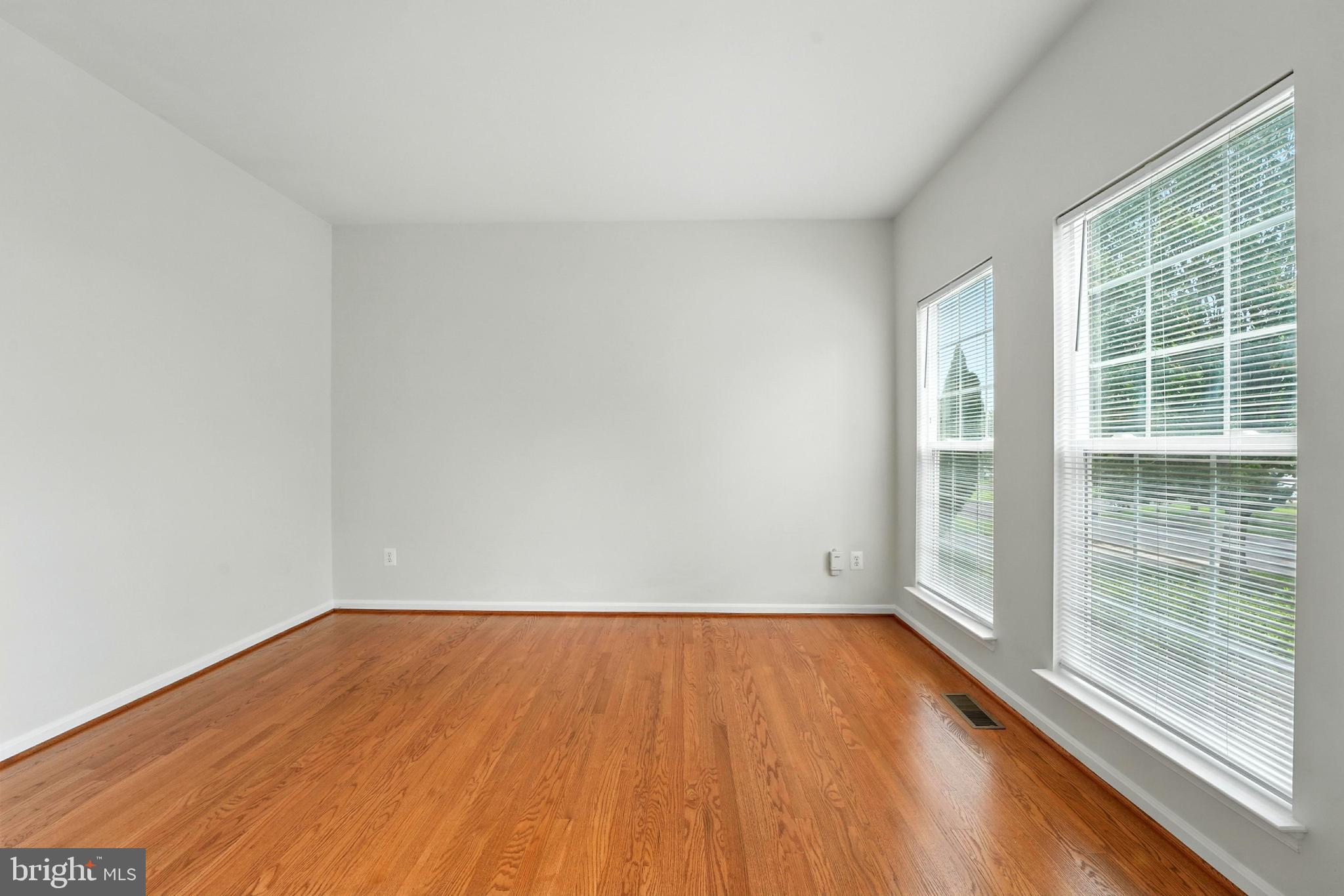 705 Holly Leaf Road Culpeper, VA 22701 - Photo 10 of 62 a view of room with window and wooden floor