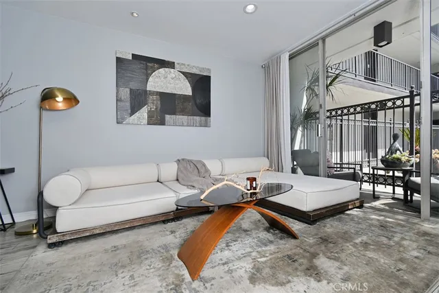 a living room with furniture and window