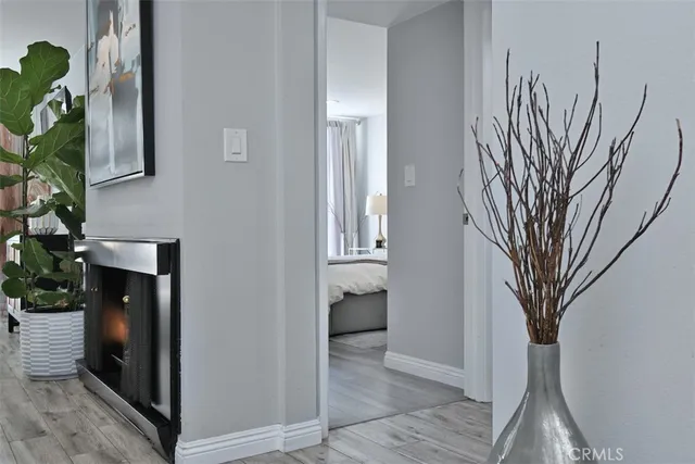 a view of a room that has a tree in it