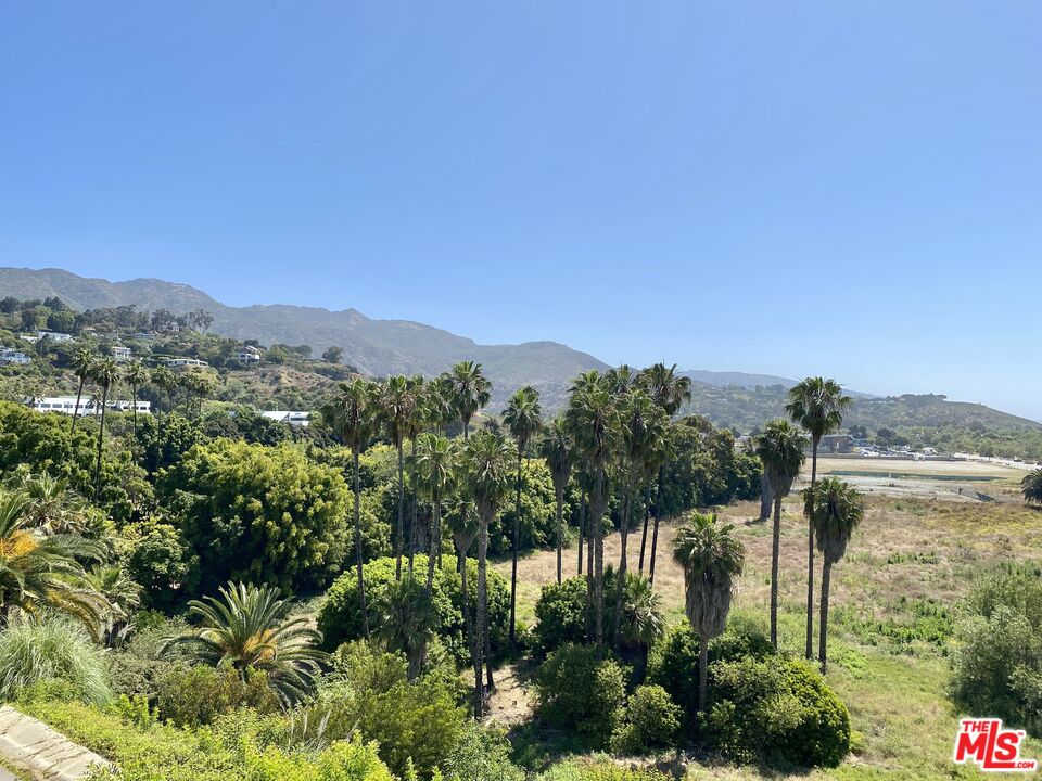 23901 Civic Center Way, Unit 114 Malibu, CA 90265 - Photo 14 of 38 a view of a city with lush green forest