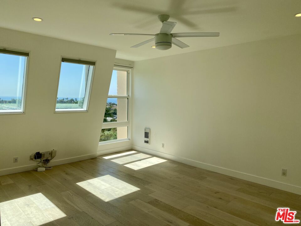 23901 Civic Center Way, Unit 114 Malibu, CA 90265 - Photo 24 of 38 a view of an empty room with a window