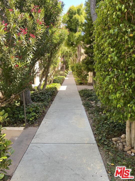 23901 Civic Center Way, Unit 114 Malibu, CA 90265 - Photo 31 of 38 a view of a pathway both side of building