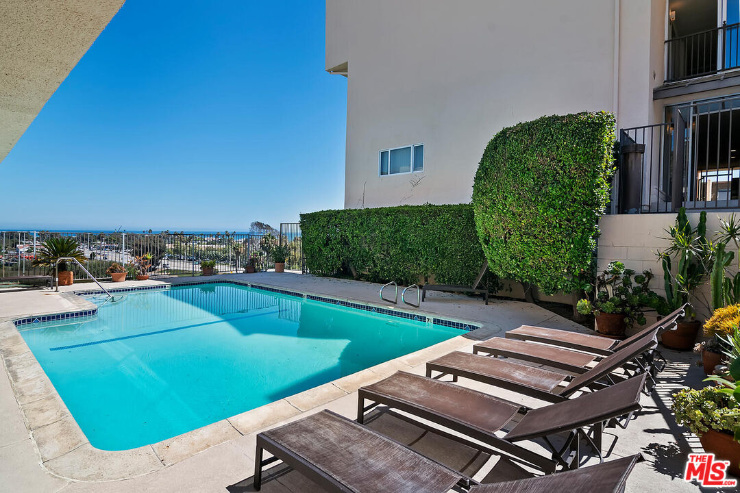 23901 Civic Center Way, Unit 114 Malibu, CA 90265 - Photo 33 of 38 a view of a chairs and table in the patio