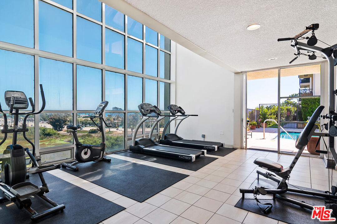 23901 Civic Center Way, Unit 114 Malibu, CA 90265 - Photo 35 of 38 a room with gym equipment