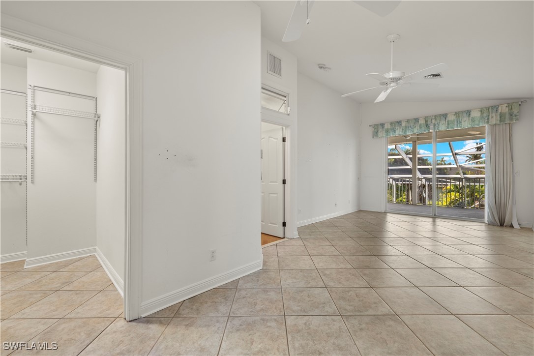 431 Rabbit Road Sanibel, FL 33957 - Photo 11 of 41 a view of an empty room with a window