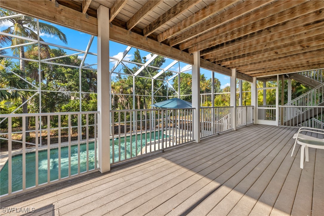431 Rabbit Road Sanibel, FL 33957 - Photo 23 of 41 a view of balcony with wooden floor