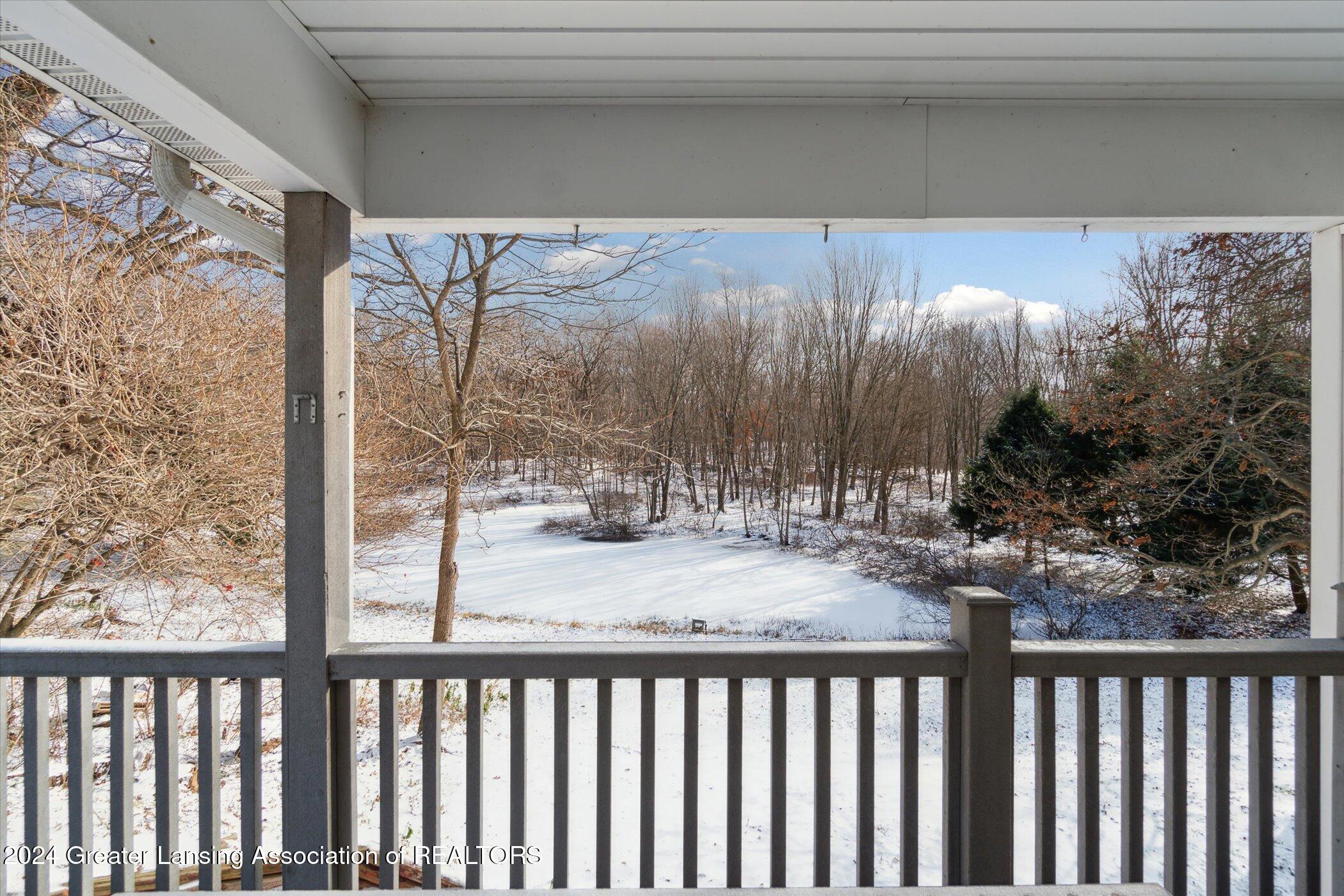 14725 Nichols Road Bath, MI 48808 - Photo 44 of 53 View of pond from deck