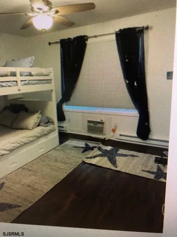 a view of kitchen with wooden floor