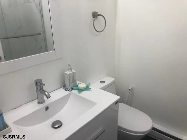 a bathroom with a sink and a toilet
