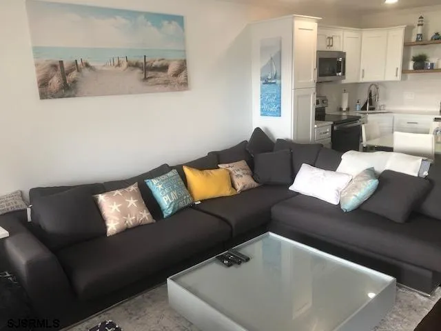 a living room with furniture and a couch