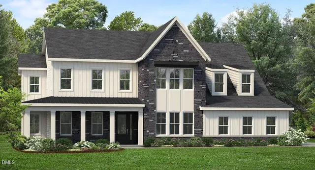 front view of a house with a yard