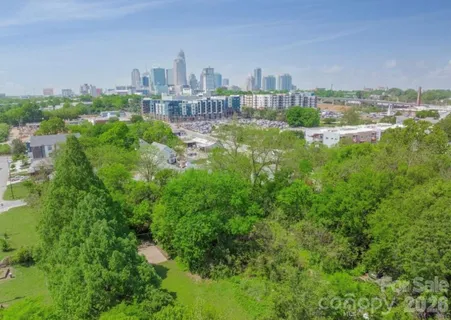 a view of a city with tall buildings