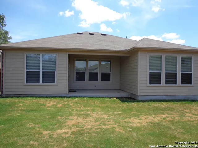 a view of a house with a garden