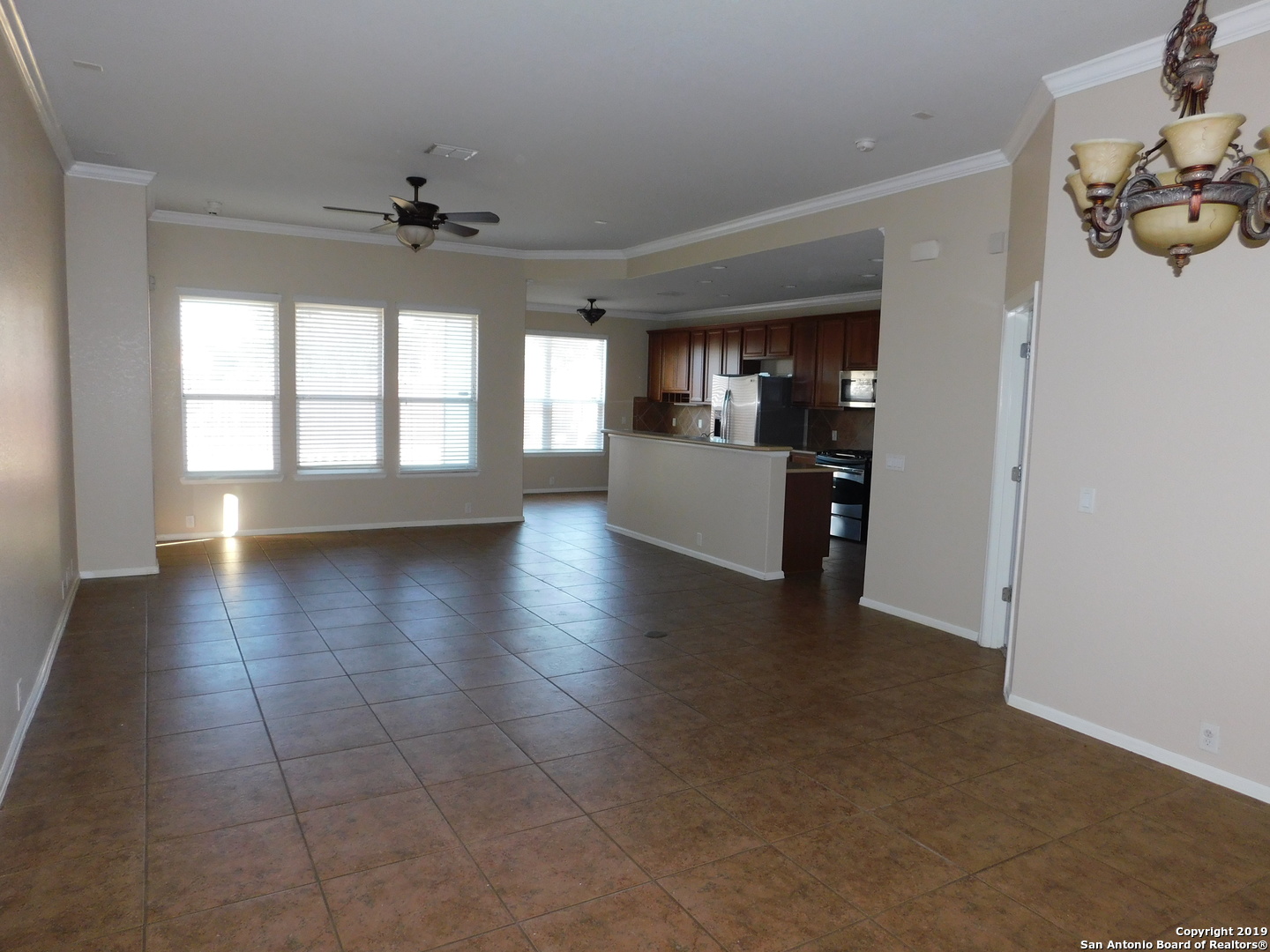 26907 Bluewater Way San Antonio, TX 78260 - Photo 3 of 13 wooden floor in an empty room with a window