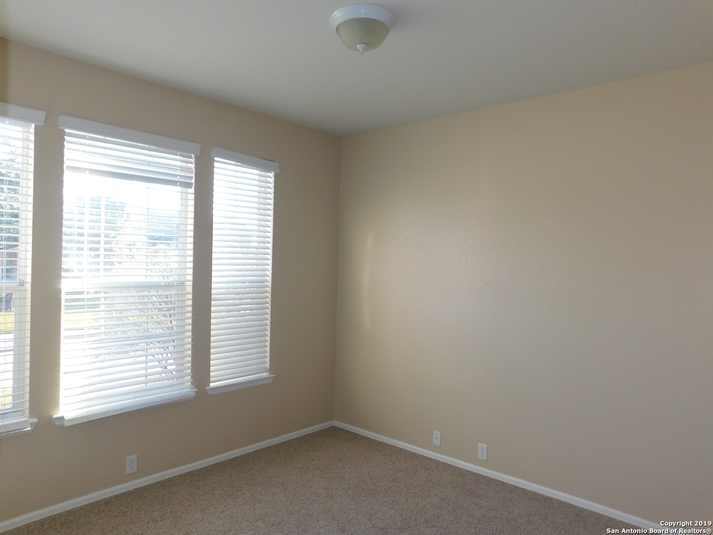 26907 Bluewater Way San Antonio, TX 78260 - Photo 8 of 13 a room that has a window in it