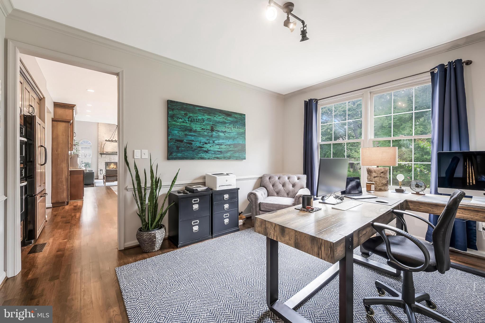 1179 Reston Avenue Herndon, VA 20194 - Photo 11 of 47 a view of a dining room with furniture window and wooden floor