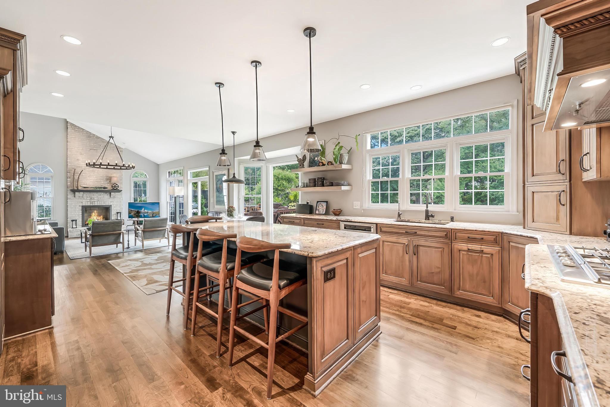 1179 Reston Avenue Herndon, VA 20194 - Photo 14 of 47 a kitchen with a large counter top space and stainless steel appliances