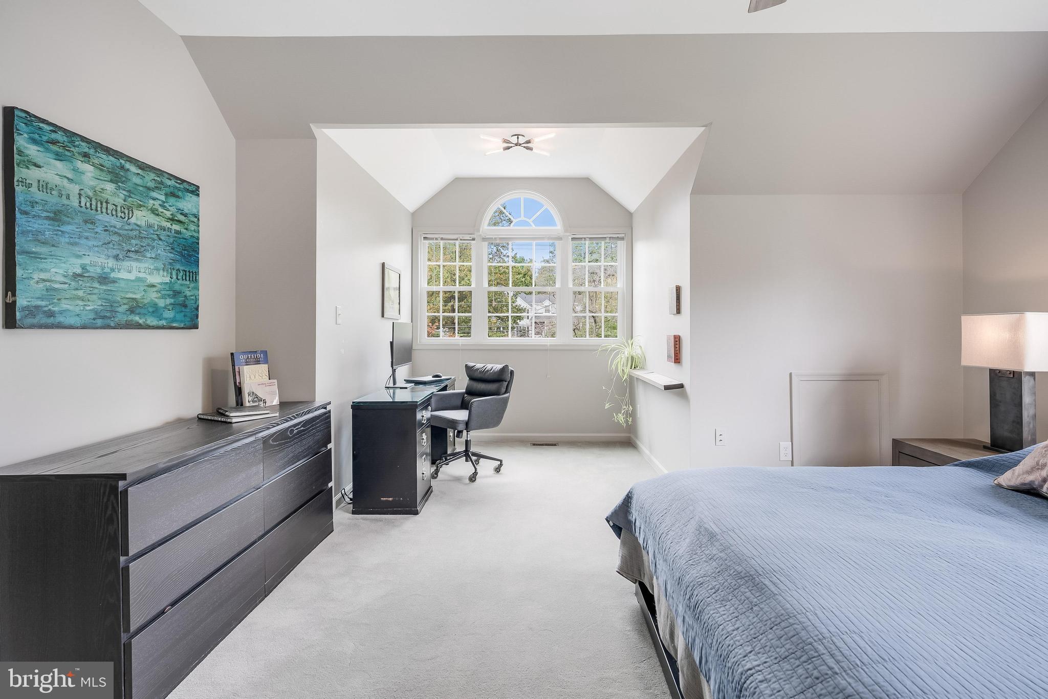 1179 Reston Avenue Herndon, VA 20194 - Photo 21 of 47 a spacious bedroom with a bed and a large window