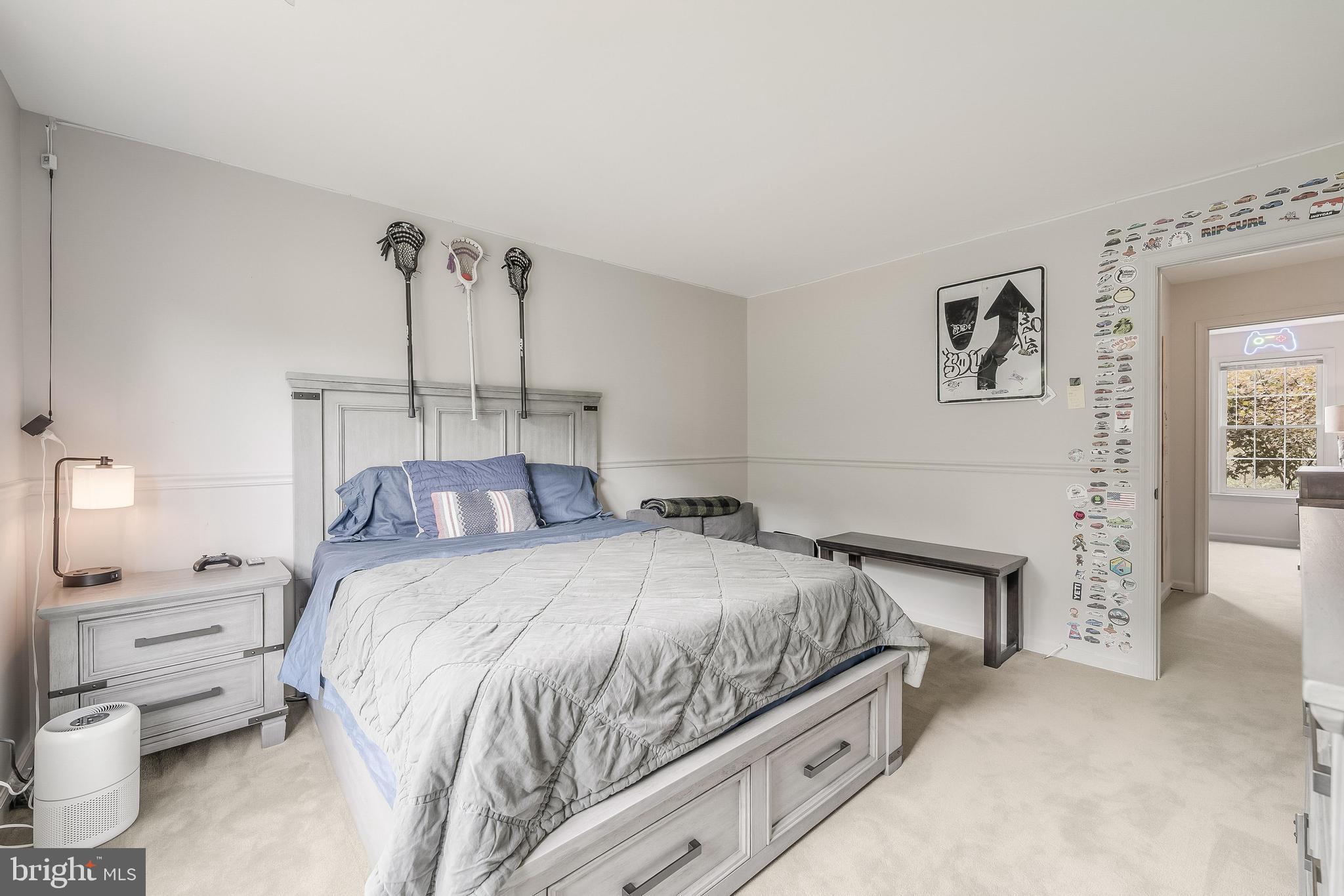 1179 Reston Avenue Herndon, VA 20194 - Photo 30 of 47 a bedroom with a bed and a fireplace