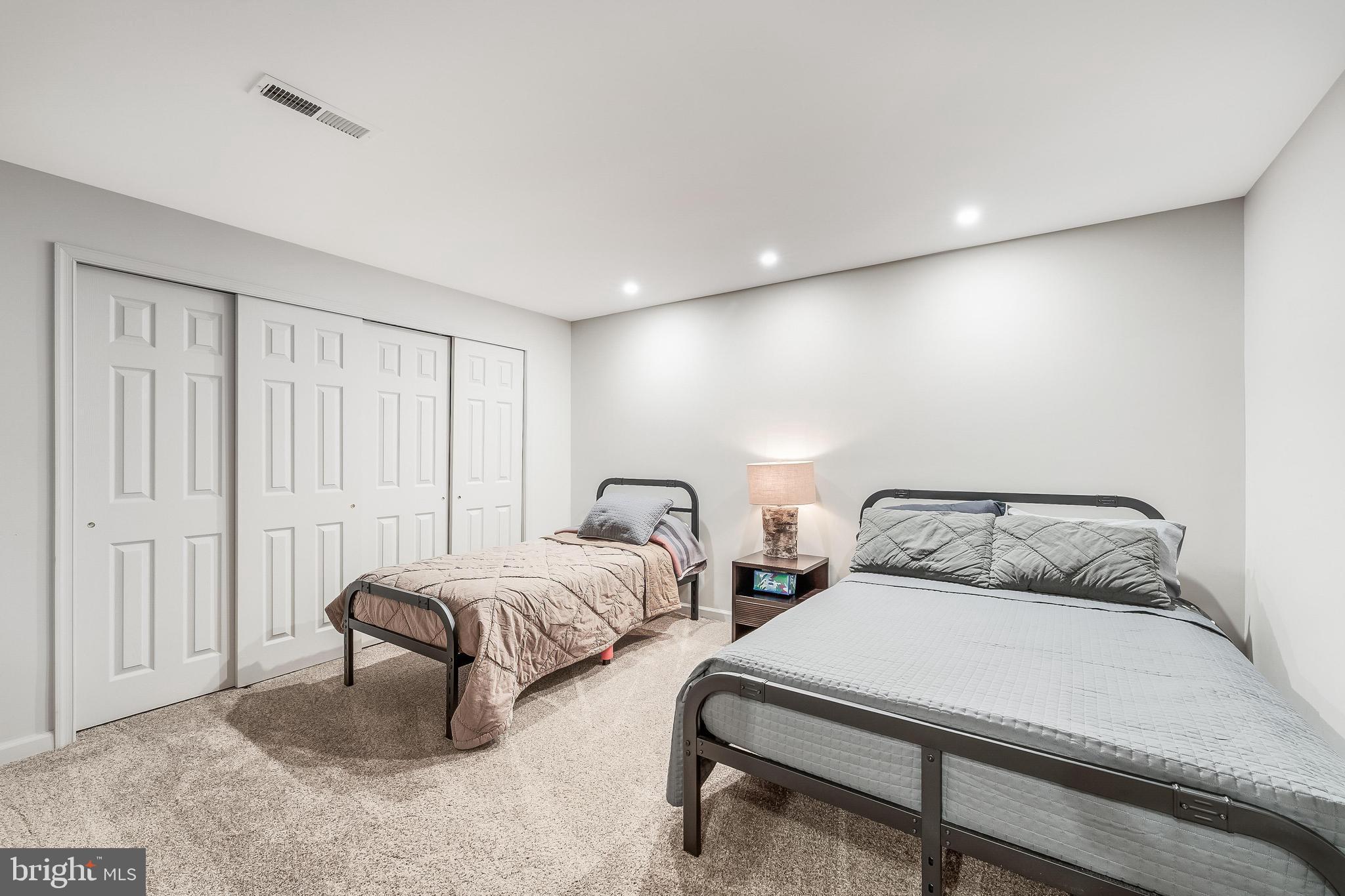 1179 Reston Avenue Herndon, VA 20194 - Photo 33 of 47 a bedroom with two beds and painted walls