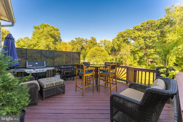 a view of a balcony with chairs